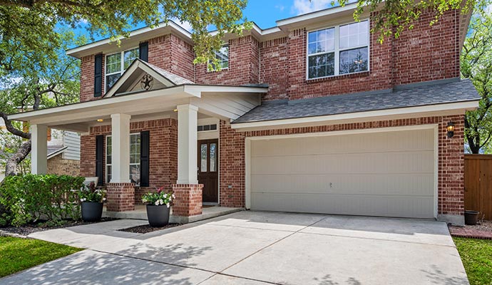 Front view of a modern closed garage with clean exterior