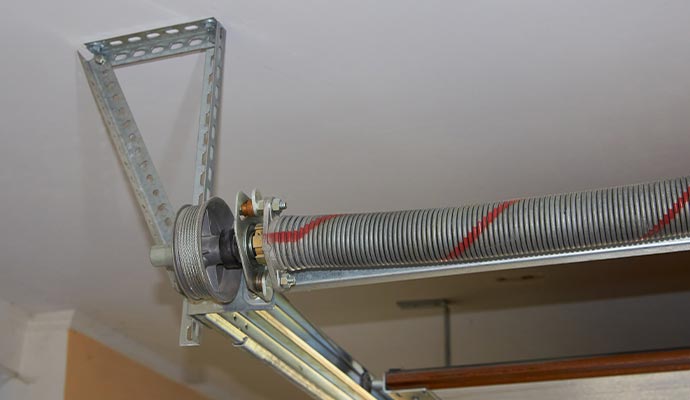 A newly installed garage door spring