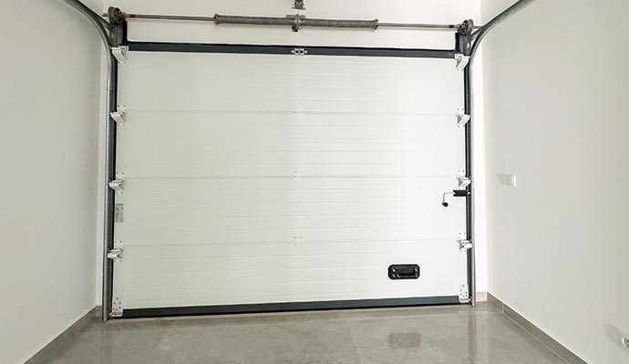 Interior view of a white sectional garage door