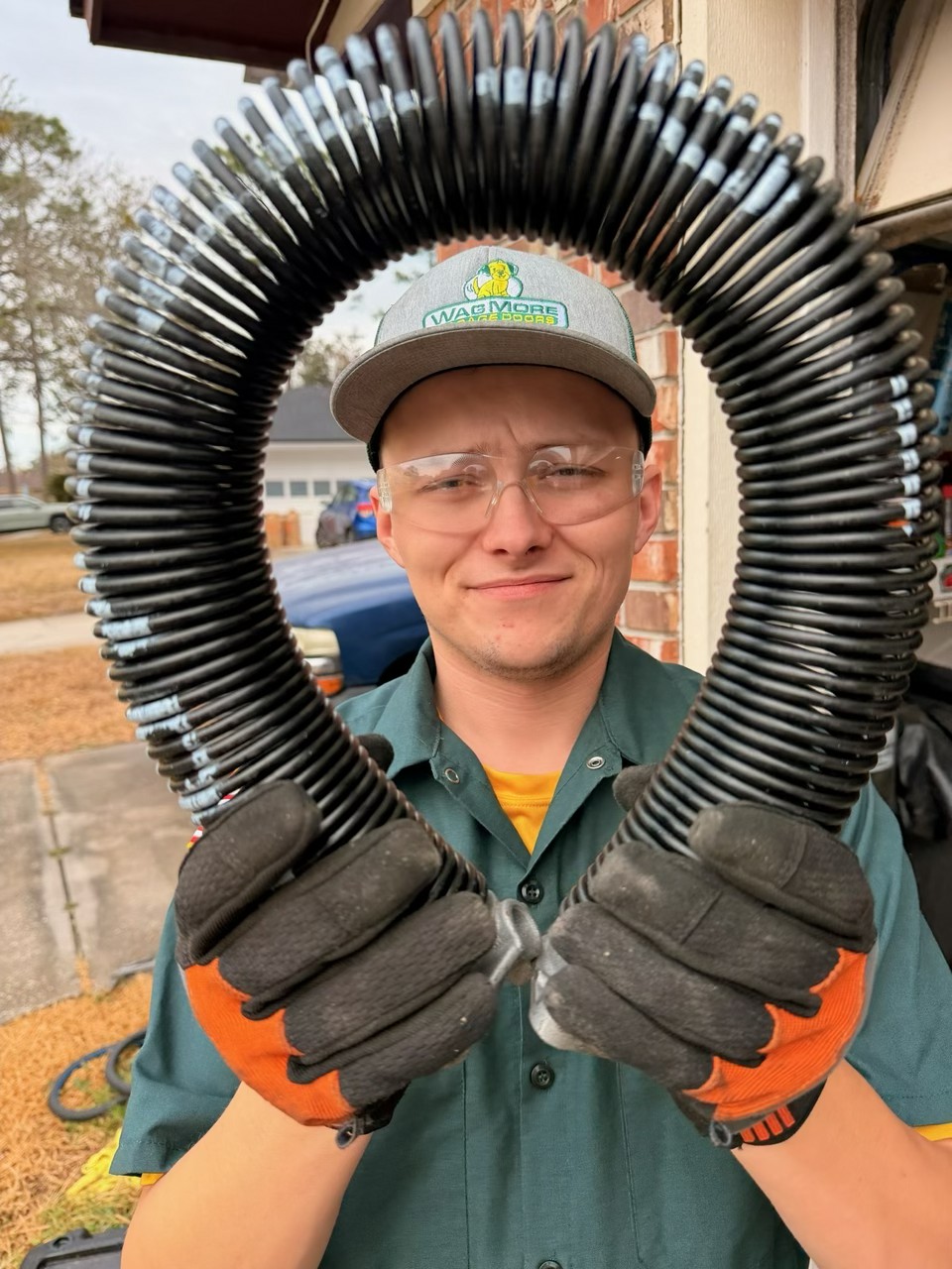 Adam adjusting a spring